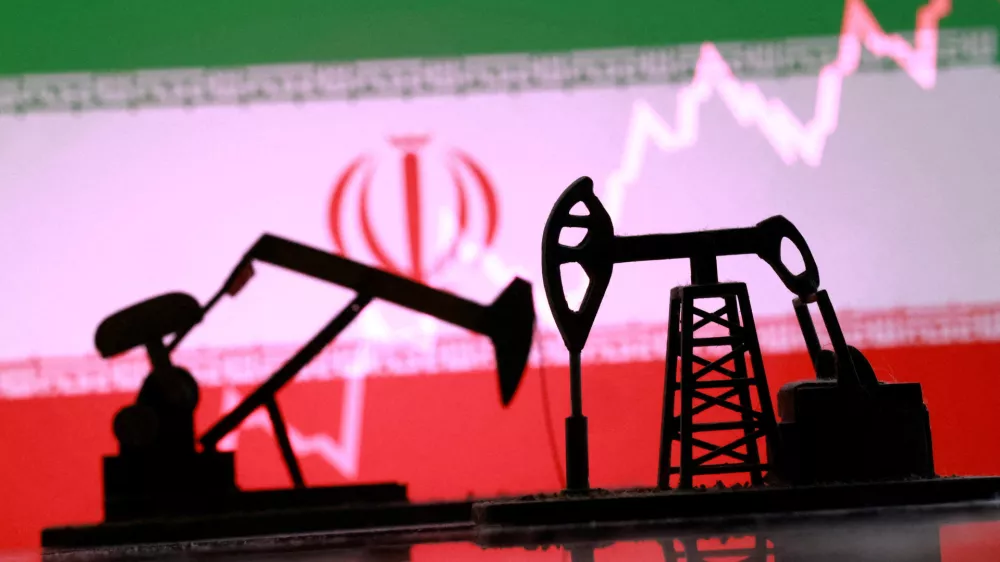 FILE PHOTO: 3D-printed oil pump jacks, Iranian flag, and a rising stock graph appear in this illustration taken March 2, 2026. REUTERS/Dado Ruvic/Illustration/File Photo