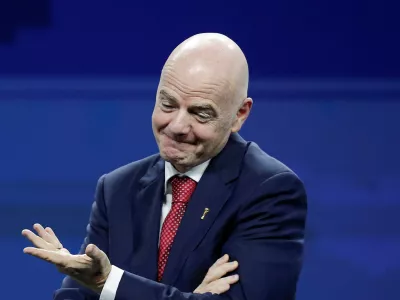FIFA President Gianni Infantino reacts on stage during a gala celebrating Conmebol's President Alejandro Dominguez's 10th anniversary as head of the organization, in Asuncion, Paraguay, January 26, 2026. REUTERS/Cesar Olmedo