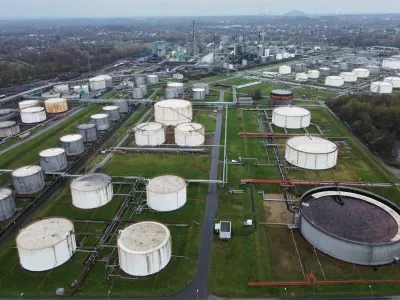 Big oil tanks are pictured in front the BP refinery in Gelsenkirchen, one of the biggest fuel producers in Germany, Wednesday, March 11, 2026. (AP Photo/Martin Meissner)