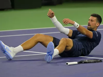 Mar 11, 2026; Indian Wells, CA, USA; Novak Djokovic (SRB) takes a moment on the court after a long rally during his fourth round match against Jack Draper (GBR) in the BNP Paribas Open at the Indian Wells Tennis Garden. Mandatory Credit: Jayne Kamin-Oncea-Imagn Images