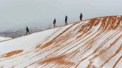 *NO UK* Snow covered sand dunes in the Sahara Desert after temperatures dropped below freezing near the town of Ain Sefra in northwestern Algeria. Photographer Karim Bouchetata captured images of the rare phenomenon in the Saharan town, known as the Gateway to the Desert, which sits around 1000 metres above sea level and is surrounded by the Atlas Mountains.Pictured: gv,general view,Image: 1082022226, License: Rights-managed, Restrictions: -GBR, Model Release: no, Pictured: gv,general view