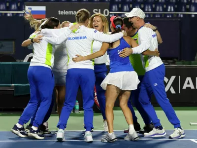 Slovenia team members celebrate Kaja Juvan Slovenia Match win during 2nd Match of 2025 Billie jean king cup play-off between the India vs Netherlands vs Slovenia held at the s.m. Krishna tennis stadium in Bangalore, India on the 15th November 2025Slovenija, tenis, Indija, pokal Billie Jean King, slavjePhoto by Rahul Goyal / ITF for the BJKCUP 
