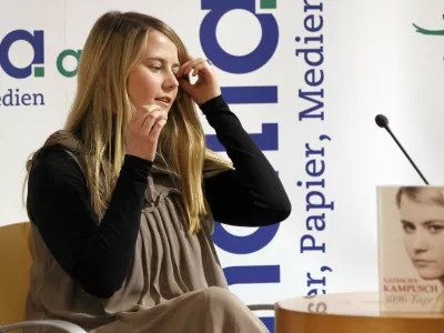 Natascha Kampusch, during the presentation of her book "3,096 Tage" (3,096 Days) at a book store in Vienna, Austria, on Thursday, Sept. 9, 2010. Kampusch, who was kidnapped at age 10 says she was repeatedly beaten, starved and forced to do housework half-naked during her 8 1/2 years at the mercy of a man who admired Hitler and considered himself an Egyptian god. (AP Photo/Leonhard Foeger, Pool)