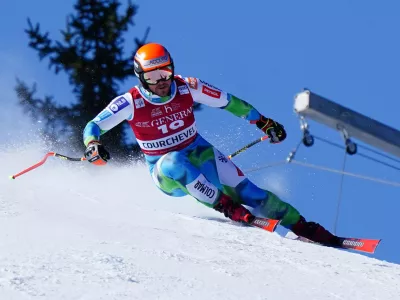 Slovenia's Miha Hrobat speeds down the course during an alpine ski, men's World Cup downhill race, in Courchevel, France, Friday, March 13, 2026. (AP Photo/Pier Marco Tacca)