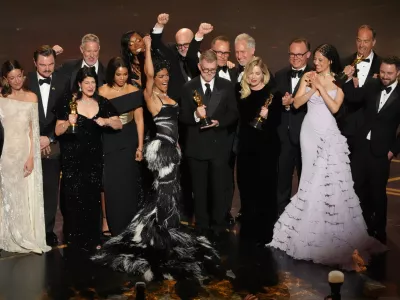 Jose Antonio Garcia, from left, Florencia Martin, Leonardo DiCaprio, Cassandra Kulukundis, Regina Hall, Shayna McHale, Teyana Taylor, Michael Bauman, Paul Thomas Anderson, Anthony Carlino, Will Weike, Sara Murphy, Chase Infiniti, Christopher Scarabosio, and Andy Jurgensen accept the award for best picture award for "One Battle After Another" during the Oscars on Sunday, March 15, 2026, at the Dolby Theatre in Los Angeles. (AP Photo/Chris Pizzello)
