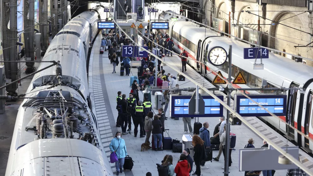 "Stay train" is written on display boards at Hamburg Central Station after long-distance traffic in northern Germany came to a standstill in Hamburg, Germany, Saturday, Oct.8, 2022. According to Deutsche Bahn, a technical malfunction is currently causing a complete standstill in long-distance traffic in northern Germany. All ICE as well as IC and EC trains in northern Germany are affected, Deutsche Bahn announced on Saturday morning. (Bodo Marks/dpa via AP)