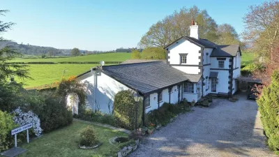 Story from Jam Press (Royal Station Sale)Pictured: The historic former railway station.Historic former railway station with link to secret romance goes on sale for just over Ł800,000A historic former railway station with a link to a secret royal romance has gone on the market for just over Ł800,000.The old Eyarth Station has been transformed into a plush country home while still keeping many of its original railway features.The station first opened in 1864 and was once a regular stop along the line.Passenger services on the route ended in 1953 and the last goods train ran in 1962, when Eyarth Station finally closed.Today the ticket office and station platform can still be seen, and the original station well, which once supplied water for the station master, has survived.The unique property sits in Llanfair Dyffryn Clwyd, near Ruthin in North Wales.It is also said to have played a part in a secret royal romance.Locals believe the former Prince of Wales, who later became King Edward VII, used the quiet station while having an affair with a local aristocrat.He is said to have stepped off the train at Eyarth rather than the busier Ruthin station to avoid being spotted.The property now boasts six bedrooms, seven bathrooms and five reception rooms.It was successfully run as a guest house for decades, as reported by Luxury Property News.Estate agents say the elegant country house offers spacious and versatile accommodation in an area famed for its natural beauty.The home is set in secluded gardens with patios and a pond.It also includes extensive parking, a paddock with stables, an established kitchen garden and two large paddocks.The grounds enjoy far-reaching views west across wooded countryside.Inside, the building still keeps key reminders of its railway past.These include part of the original platform, the old ticket office and even the station well, all carefully preserved within the property.The home is being marketed by estate agents Cavendish with a guide price of Ł820,000.ENDS,Image: 1081655754, License: Rights-managed, Restrictions:, Model Release: no