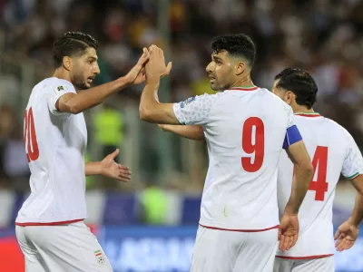 FILE PHOTO: Soccer Football - World Cup - Asian Qualifiers - Group A - Iran v North Korea - Azadi Stadium, Tehran, Iran - June 10, 2025 Iran's Mehdi Taremi celebrates scoring their second goal with Mohammad Mohebi Majid Asgaripour/WANA (West Asia News Agency) via REUTERS  ATTENTION EDITORS - THIS IMAGE HAS BEEN SUPPLIED BY A THIRD PARTY./File Photo