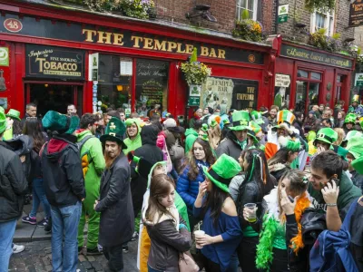 Dublin, Ireland - March 17, 2014: Saint Patrick's Day parade in Dublin Ireland on March 17, 2014: People dress up Saint Patrick's at The Temple Bar