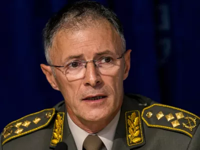 Serbian army chief-of-staff, Gen. Milan Mojsilovic speaks during a press conference in Belgrade, Serbia, Monday, Oct. 2, 2023. The Serbian army has cut nearly by a half the number of troops near the border with Kosovo, top officials said on Monday, also denying U.S. and other reports of a mass buildup in the wake of a shooting over a week ago that killed four people and raised fears of instability in the volatile region. (AP Photo/Darko Vojinovic)