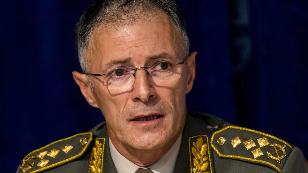 Serbian army chief-of-staff, Gen. Milan Mojsilovic speaks during a press conference in Belgrade, Serbia, Monday, Oct. 2, 2023. The Serbian army has cut nearly by a half the number of troops near the border with Kosovo, top officials said on Monday, also denying U.S. and other reports of a mass buildup in the wake of a shooting over a week ago that killed four people and raised fears of instability in the volatile region. (AP Photo/Darko Vojinovic)
