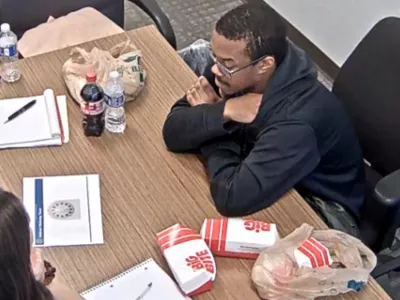 FILE - This image from video contained in a Justice Department court filing shows Brian J. Cole Jr., being interrogated by FBI investigators in Woodbridge, Va., Dec. 4, 2025. (Justice Department via AP)