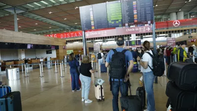 20 September 2025, Berlin: People at BER airport. A cyber attack has caused delays at Berlin's BER airport. A service provider for the passenger handling systems was attacked on Friday evening, the airport announced. Photo: Carsten Koall/dpa