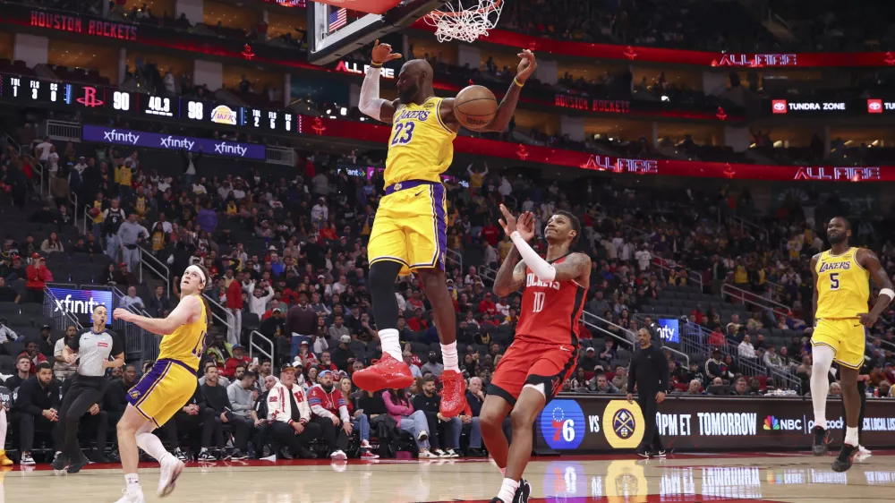 Mar 16, 2026; Houston, Texas, USA; Los Angeles Lakers forward LeBron James (23) scores a basket during the fourth quarter against the Houston Rockets at Toyota Center. Mandatory Credit: Troy Taormina-Imagn Images