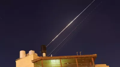 An Iranian missile with cluster munitions flies towards Israel, amid the U.S.-Israeli conflict with Iran, as seen from Hebron, in the Israeli-occupied West Bank, March 18, 2026. Picture taken with a long exposure. REUTERS/Mussa Qawasma
