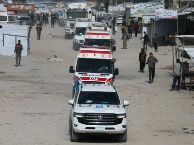 A UN vehicle leads ambulances carrying war-wounded people and patients who leave Gaza, for treatment abroad, through the Rafah border crossing between Gaza and Egypt after it was opened by Israel on Thursday for a limited number of people, in Khan Younis in the southern Gaza Strip, March 19, 2026. REUTERS/Ramadan Abed