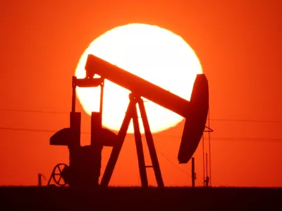 The sun sets behind an oil pump outside Vaudoy-en-Brie, near Paris, France, March 18, 2026. REUTERS/Christian Hartmann