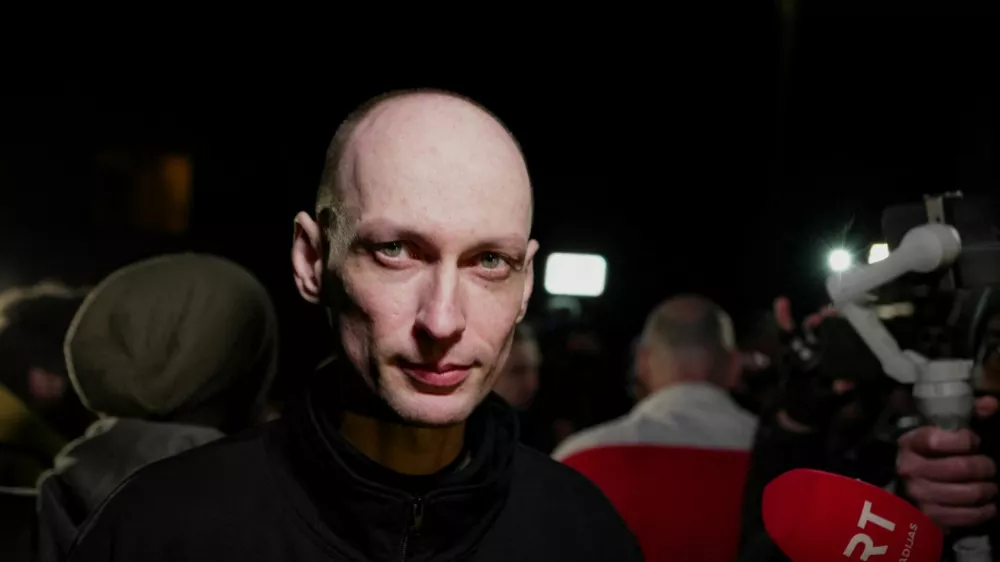 A prisoner released from Belarus, Eduard Palchys, speaks to the media after arriving in Vilnius, Lithuania, March 19, 2026. REUTERS/Janis Laizans