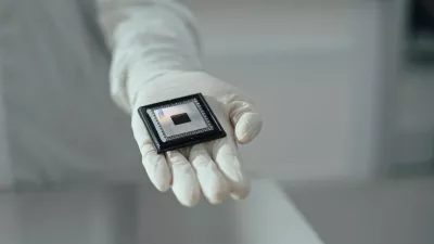 A person shows Google Quantum AI's "Willow" chip, in this undated handout photo obtained by Reuters on December 6, 2024. Google/Handout via REUTERS  THIS IMAGE HAS BEEN SUPPLIED BY A THIRD PARTY. NO RESALES. NO ARCHIVES.