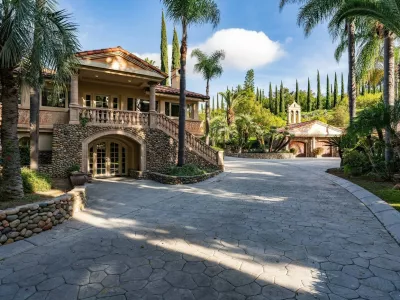 EXCLUSIVE: Story from Jam Press (Herbalife Zoo Estate)Herbalife co-founder's 5m estate complete with own ZOO of wild animals hits marketThe co-founder of Herbalife's 5 million estate with its own zoo of wild animals has gone on the market.The former home of Dick Marconi, known for co-founding the MLM nutritional supplements brand, sits on 1,225 acres of land and comes with a hefty price tag to match.Dubbed Marconi Ranch, the 5,000 sq ft mansion is near the city of San Juan Capistrano in California, US, bordering Caspar's Wilderness Park.Fittingly, the estate also has an emphasis on nature &ndash; serving as a working farm with over 20,000 Eureka lemon trees, 1,000 Pistoia olive trees, and organically farmed grapefruit and tangerine trees.A private zoo is a major feature of the property, with the menagerie including zebras, elands and tortoises.Also outside is a spacious pool complex, gorgeously landscaped grounds, a two-acre lake and four ponds.But the home of Marconi, who died in 2024 at the age of 91, is equally as special inside, boasting four bedrooms and three bathrooms.The main residence is a Tuscan-inspired mansion with vaulted ceilings with tongue-in-groove planks.The palatial master suite includes a luxurious marble bath and spacious walk-in closets.Meanwhile, the expansive kitchen includes a lovely marble island.Additional amenities include an office, art studio, meditation room, wine and cigar lounge, and workout centre.Separate from the main residence sits a two-bedroom guest house and staff quarters sharing the complex, as reported by Luxury Property News.Marconi reportedly moved from Indiana to California in the late 1950s with just 00 to his name, but went on to found supplement company D'.12 Mar 2026Pictured: Story from Jam Press (Herbalife Zoo Estate)Herbalife co-founder's 5m estate complete with own ZOO of wild animals hits marketThe co-founder of Herbalife's 5 million estate with its own zoo of wild animals has gone on the market.The former home of Dick Marconi, known for co-founding the MLM nutritional supplements brand, sits on 1,225 acres of land and comes with a hefty price tag to match.Dubbed Marconi Ranch, the 5,000 sq ft mansion is near the city of San Juan Capistrano in California, US, bordering Caspar's Wilderness Park.Fittingly, the estate also has an emphasis on nature &ndash; serving as a working farm with over 20,000 Eureka lemon trees, 1,000 Pistoia olive trees, and organically farmed grapefruit and tangerine trees.A private zoo is a major feature of the property, with the menagerie including zebras, elands and tortoises.Also outside is a spacious pool complex, gorgeously landscaped grounds, a two-acre lake and four ponds.But the home of.,Image: 1082166460, License: Rights-managed, Restrictions: NO Australia, Germany, Norway, South Korea, Sweden, United Kingdom, United States, Unknown Country, Model Release: no, Pictured: The 5m estate