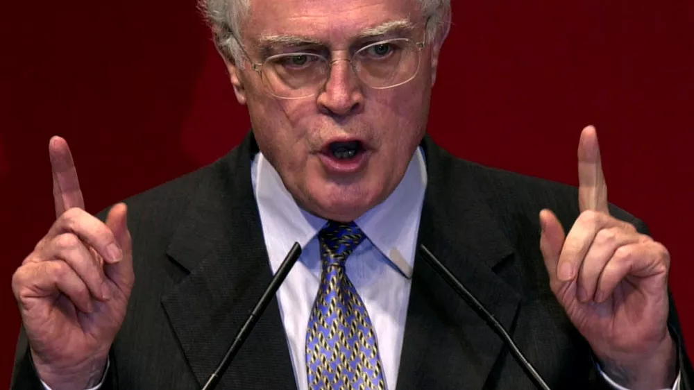 FILE PHOTO: French Prime Minister Lionel Jospin gestures as he delivers a speech during a meeting of the Socialist party to promote the September 24th referendum, in France, September 19, 2000. REUTERS/Xavier Lhospice/File Photo