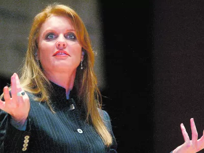 Duchess of York Sarah Ferguson speaks to local members of Weight Watchers Tuesday, April 4, 2004, at the Meyerhoff Symphony Hall in Baltimore, Md. The Duchess led the gathering which shared inspirational stories and met with local weight loss success members. (AP Photo/ Matt Houston)------3k