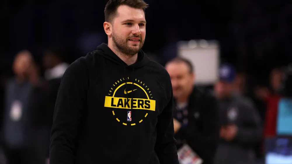 Jan 13, 2026; Los Angeles, California, USA; Los Angeles Lakers guard Luka Doncic (77) warms up before the game against the Atlanta Hawks at Crypto.com Arena. Mandatory Credit: Kiyoshi Mio-Imagn Images