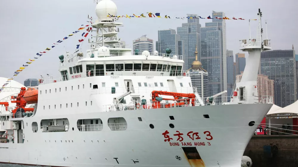 Dong Fang Hong 3, a deep-sea research vessel, docks at a pier as she joins the Ocean University of China's fleet of Dong Fang Hong scientific research vessels, in Qingdao, Shandong province, China October 25, 2019. cnsphoto via REUTERS ATTENTION EDITORS - THIS IMAGE WAS PROVIDED BY A THIRD PARTY. CHINA OUT./File Photo     To Match CHINA-MILITARY/OCEAN-MAPPING