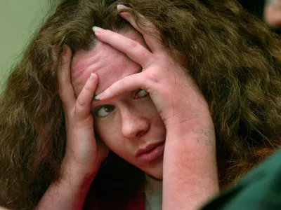 June 11, 2021; Knoxville, TN, USA;Convicted Job Corps killer Christa Gail Pike returned to a Knox County courtroom today for a second chance at appealing her conviction -- a legal maneuver she once rejected. Her mother, Carissa Hansen of Texas, was the first of seven witnesses scheduled to testify today before Criminal Court Judge Mary Beth Leibowitz. Pike listens to her mother detail Pike's difficult childhood, including her premature birth, marijuana and cocaine use and abortion. Mandatory Credit: Knoxville News Sentinel-USA TODAY NETWORK