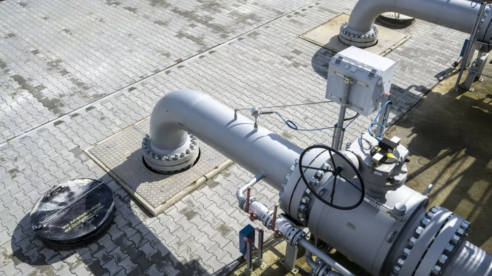 Two pipes lead into the ground at the pumping station of the "Augusta" gas pipeline. The almost 41-kilometer-long gas pipeline from Wertingen to K&ouml;tz is intended to improve the supply of natural gas in Bavaria and Baden-W&uuml;rttemberg. The pipeline is being built in such a way that it can later also be operated with hydrogen. The total investment amounts to around 180 million euros.