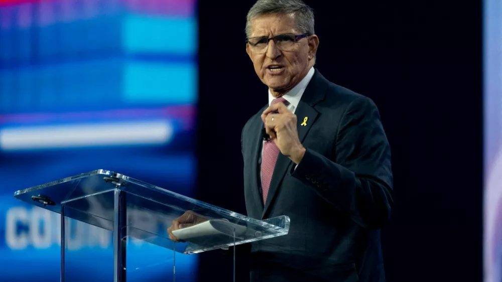FILE PHOTO: Former Trump National Security Advisor and retired three-star Lt. Gen. Michael Flynn speaks during the AmericaFest 2024 conference sponsored by conservative group Turning Point in Phoenix, Arizona, U.S. December 20, 2024. REUTERS/Cheney Orr/File Photo