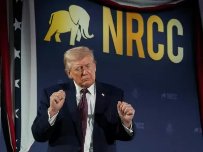 U.S. President Donald Trump dances during the National Republican Congressional Committee (NRCC) annual fundraising dinner in Washington, D.C., U.S., March 25, 2026. REUTERS/Ken Cedeno