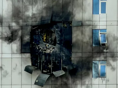 FILE PHOTO: A building that was damaged by an Iranian drone attack, after Israel and the U.S. launched strikes on Iran, in Juffair, Manama, Bahrain, March 1, 2026. REUTERS/Hamad I Mohammed/File Photo