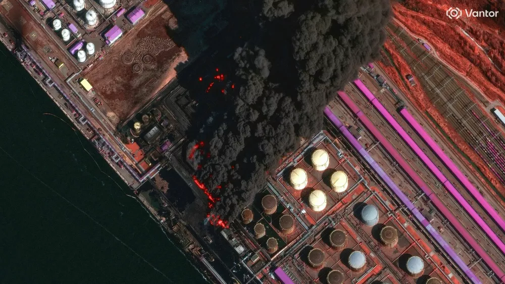 A satellite near-infrared image shows smoke rising from Russia's Baltic port of Ust-Luga after a Ukrainian attack, in Ust-Luga, Leningrad Oblast, March 27, 2026. Vantor/Handout via REUTERS THIS IMAGE HAS BEEN SUPPLIED BY A THIRD PARTY. NO RESALES. NO ARCHIVES. MANDATORY CREDIT. MUST NOT OBSCURE LOGO.