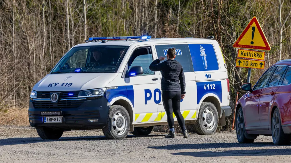 A Police car blocks the Savistontie road after two unidentified drones entered and landed in Finnish territory, in Kouvola, Finland, Sunday, March 29, 2026 (Sasu J&auml;rnstedt/Lehtikuva via AP)
