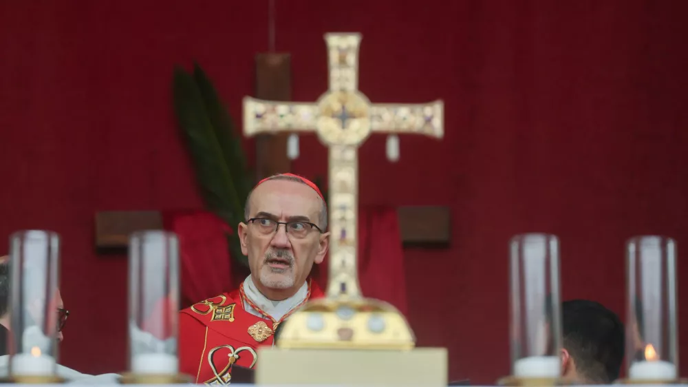 Cardinal Pierbattista Pizzaballa, the Latin Patriarch of Jerusalem, holds a prayer service to mark Palm Sunday in Jerusalem, Sunday, March 29, 2026. (Ammar Awad/Pool Photo via AP)