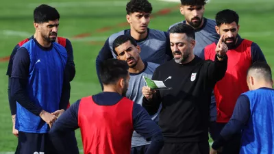 Soccer Football - International Friendly - Iran Training - Huseyin Aygun Football Center, Antalya, Turkey - March 25, 2026 Iran's Hossein Kanaani, Hossein Abraghouei and other teammates with assistant coach Saeed Alhoei during training REUTERS/Umit Bektas