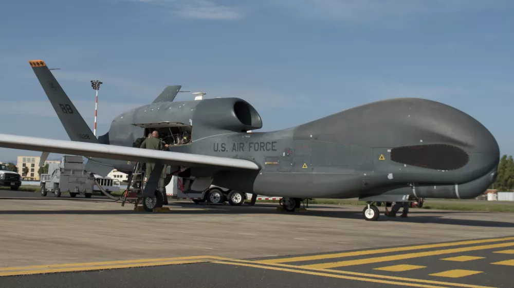 In this Oct. 24, 2018, photo released by the U.S. Air Force, members of the 7th Reconnaissance Squadron prepare to launch an RQ-4 Global Hawk at Naval Air Station Sigonella, Italy. Iran's Revolutionary Guard shot down a U.S. RQ-4 Global Hawk on Thursday, June 20, 2019, amid heightened tensions between Tehran and Washington over its collapsing nuclear deal with world powers, American and Iranian officials said, though they disputed the circumstances of the incident. (Staff Sgt. Ramon A. Adelan/U.S. Air Force via AP)