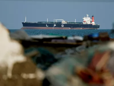 FILE PHOTO: An LPG gas tanker at anchor as traffic is down in the Strait of Hormuz, amid the U.S.-Israeli conflict with Iran, in Shinas, Oman, March 11, 2026. REUTERS/Benoit Tessier/File Photo