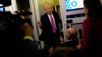 U.S. President Donald Trump talks to members of the media aboard Air Force One en route to Joint Base Andrews, Maryland, U.S., March 29, 2026. REUTERS/Elizabeth Frantz