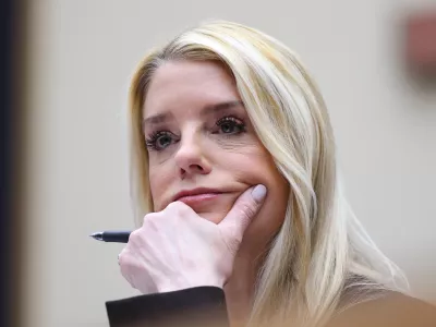 FILE - Attorney General Pam Bondi listens as she testifies before a House Judiciary Committee oversight hearing on Capitol Hill in Washington, Feb. 11, 2026, in Washington. (AP Photo/Tom Brenner, File)