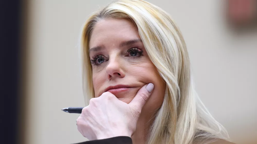 FILE - Attorney General Pam Bondi listens as she testifies before a House Judiciary Committee oversight hearing on Capitol Hill in Washington, Feb. 11, 2026, in Washington. (AP Photo/Tom Brenner, File)