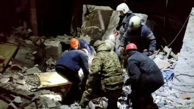 Emergency responders retrieve bodies from the rubble of a devastated building following a Ukrainian attack in a location given as Lysychansk, in the occupied eastern Ukrainian region of Luhansk, in this screen grab obtained from a video released February 3, 2024. Russian Emergencies Ministry/Handout via REUTERS THIS IMAGE HAS BEEN SUPPLIED BY A THIRD PARTY. MANDATORY CREDIT. NO RESALES. NO ARCHIVES.