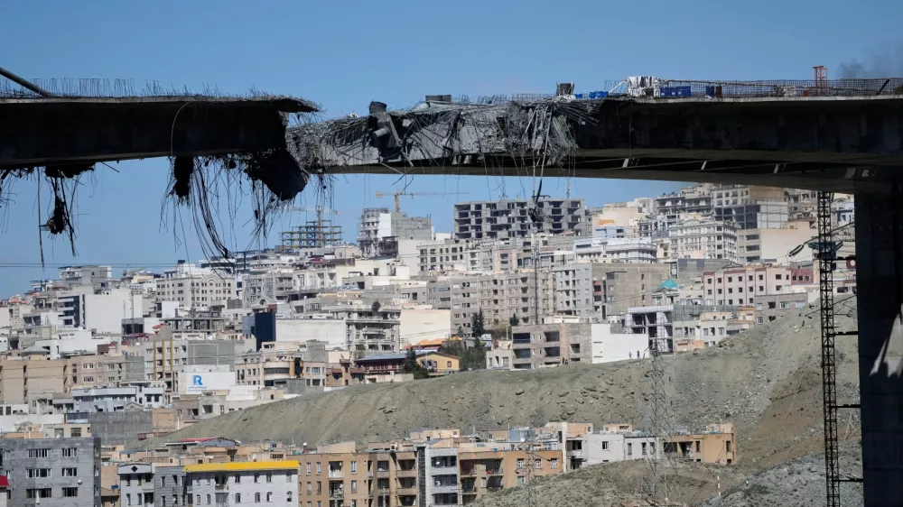 A bridge struck by U.S. airstrikes on Thursday is seen in the town of Karaj, west of Tehran, Iran, Friday, April 3, 2026. (AP Photo/Vahid Salemi)