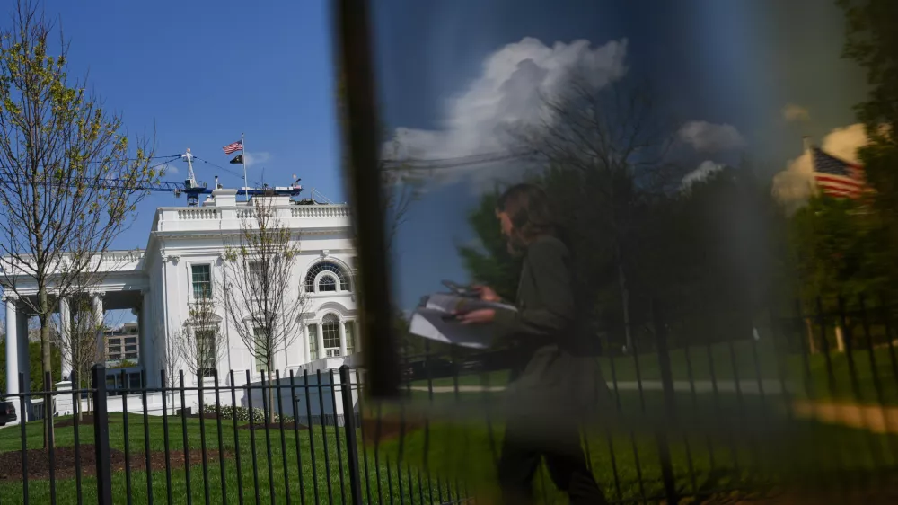 Cranes being used to construct the new White House ballroom are seen around the White House, Saturday, April 4, 2026, in Washington. (AP Photo/Julia Demaree Nikhinson)