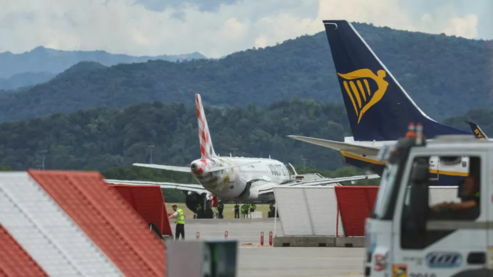 Aircrafts are seen at Milan Bergamo Airport, after flight operations were temporarily suspended when a person died on a runway during take-off preparations, in Orio al Serio, near Bergamo, Italy, July 8, 2025. REUTERS/Claudia Greco
