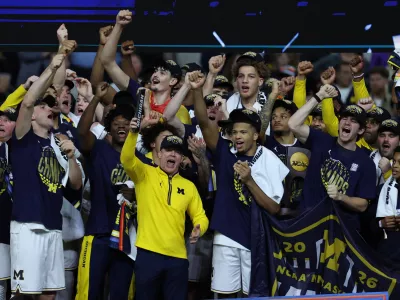 Apr 6, 2026; Indianapolis, IN, USA; Michigan Wolverines head coach Dusty May celebrates after defeating the UConn Huskies in the national championship of the Final Four of the men's 2026 NCAA Tournament at Lucas Oil Stadium. Mandatory Credit: Trevor Ruszkowski-Imagn Images