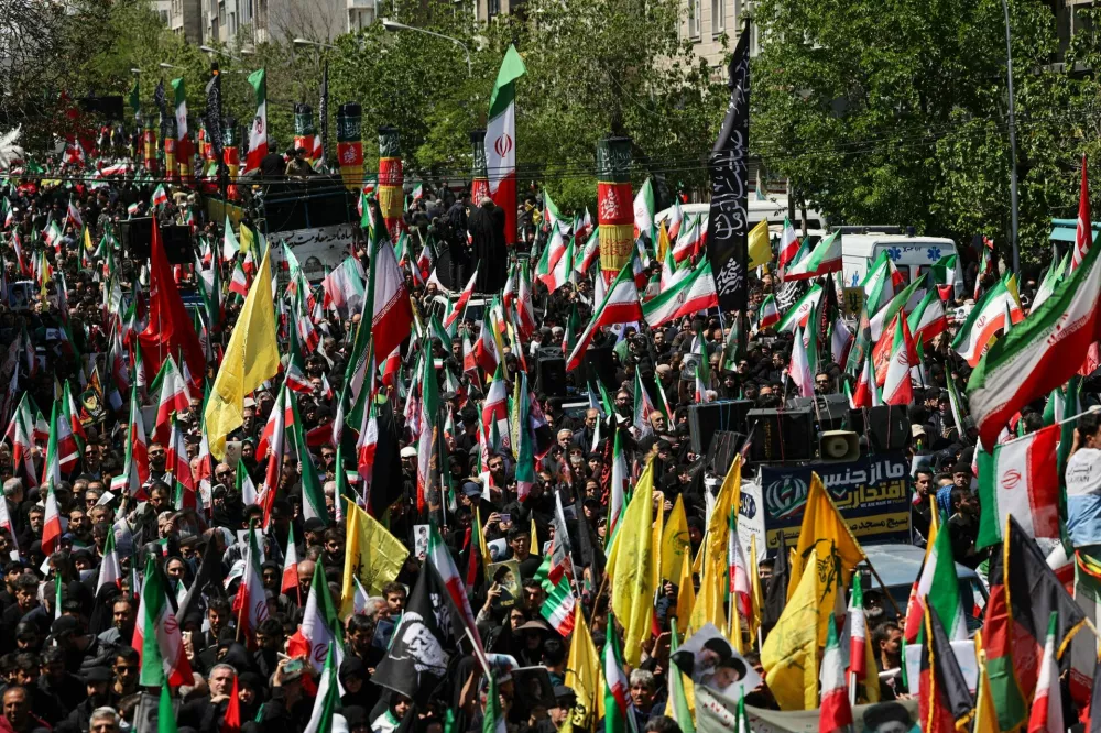 Iranian people attend a ceremony marking 40 days since the late Supreme Leader of Iran, Ayatollah Ali Khamenei, was killed in Israeli and U.S. strikes, in Tehran, Iran, April 9, 2026. Majid Asgaripour/WANA (West Asia News Agency) via REUTERS ATTENTION EDITORS - THIS PICTURE WAS PROVIDED BY A THIRD PARTY