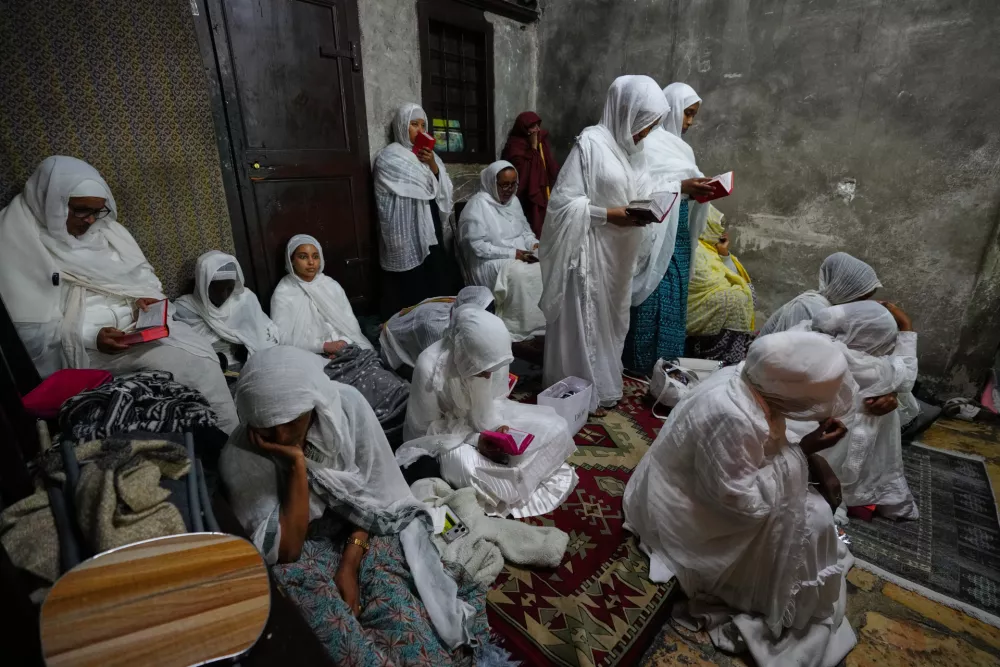 Ethiopian Orthodox Christian worshippers pray at Deir Al-Sultan monastery on top of the Church of the Holy Sepulchre after restrictions were lifted following a ceasefire reached between Iran, Israel and the United States, in Jerusalem's Old City, Thursday, April 9, 2026. (AP Photo/Mahmoud Illean)