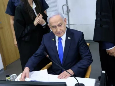 FILE PHOTO: Israeli Prime Minister Benjamin Netanyahu attends his trial on corruption charges at the district court in Tel Aviv, Israel, 21 April, 2025.  Moti Kimchi/Pool via REUTERS/File Photo
